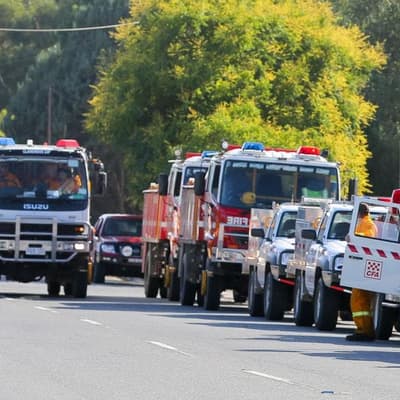 Structures destroyed, power out as erratic fire burns