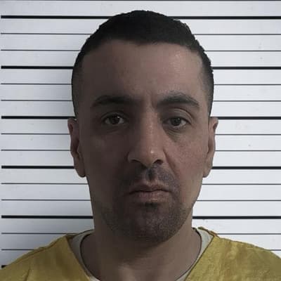 Iraq issues strange mug shots of Aussie crime kingpin