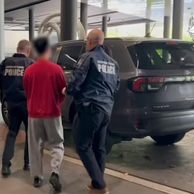 Two Chinese nationals charged over alleged spy ring