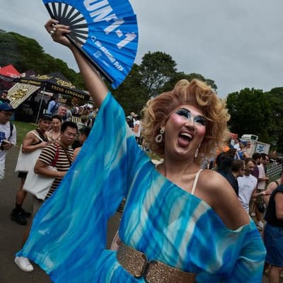 Grey skies can't deter colourful Mardi Gras crowd