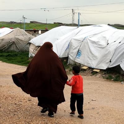 Australia says IS fighters' families not welcome back