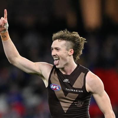 Arch-rivals' bid fails as AFL young gun re-signs