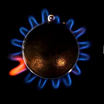 Gas producer to cut jobs, review assets as profit falls