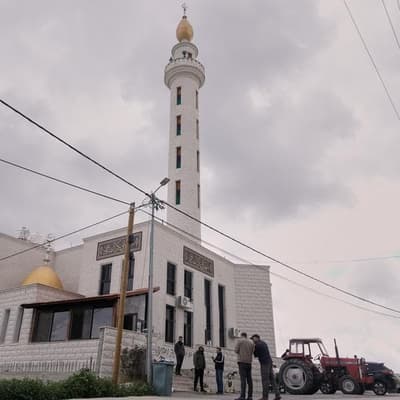 Israeli settlers torch and deface a West Bank mosque