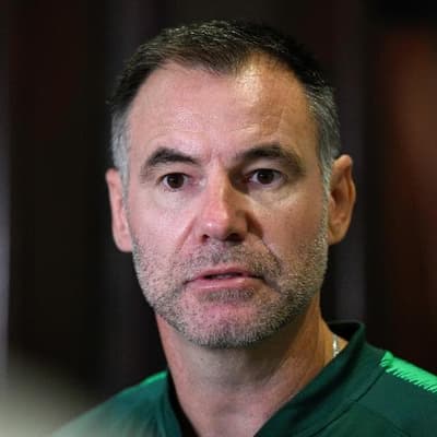 A man named Tracy helps Milicic solve a Chinese puzzle