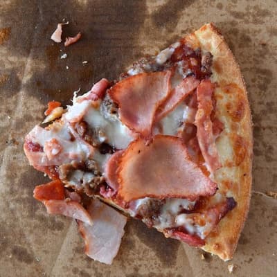 Investors take big slice out of Domino's despite profit