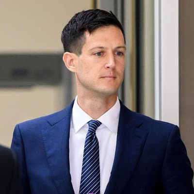 Former MP takes stand to defend child sex charges