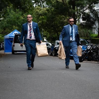 Two men armed with knives shot dead in two states