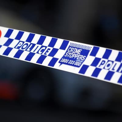 Murder charge after body found at regional property