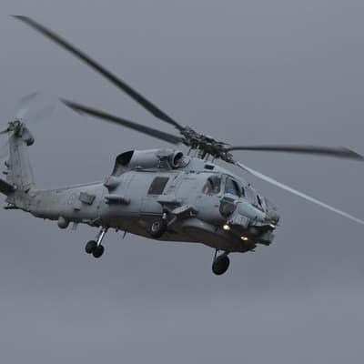 China closes in on Australian helicopter in Yellow Sea