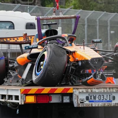 'Sorry' Piastri crashes before home GP, Russell wins