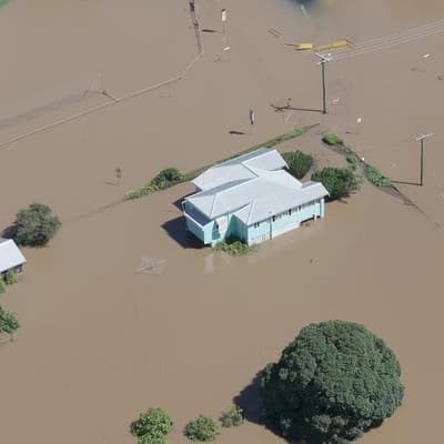Waterlogged city waits to learn extent of latest floods