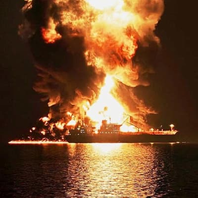 Tankers burn as Iranian strikes defy Trump's 'victory'