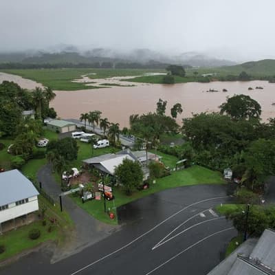 Intensifying storm looms for flood-soaked communities