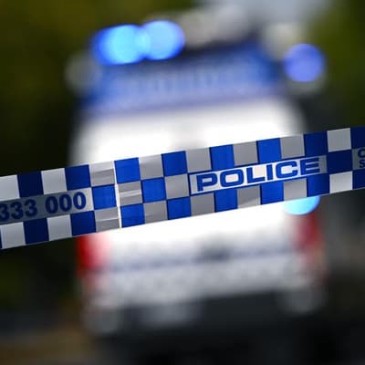 Armed man arrested after body found on highway