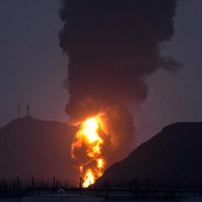 Iran hits Kuwaiti oil refinery, blasts boom over Tehran