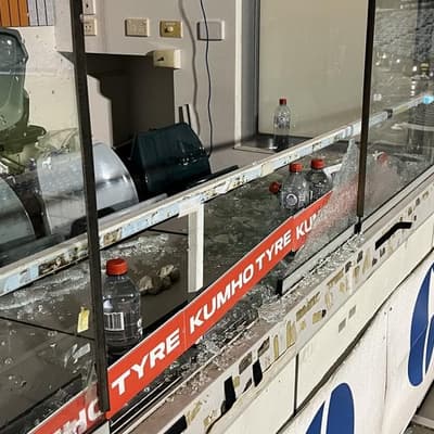 Coach injured by shattered glass at Canberra Stadium