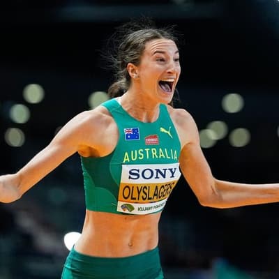 World silver for Olyslagers as old rival soars back