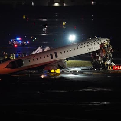 Pilots killed after jet hits fire truck at NY airport