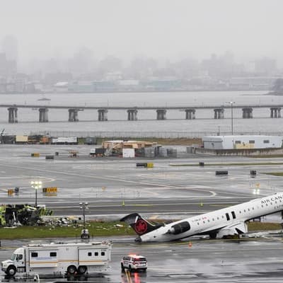 Two dead in NY jet collision, ICE deployed to airports