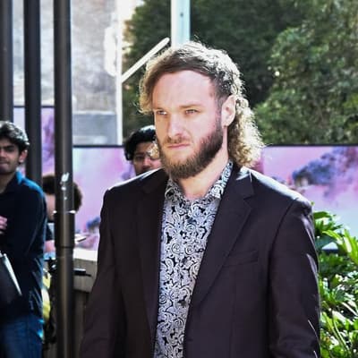 Bailed neo-Nazi's call to free accused war criminal