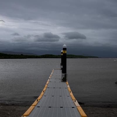 Cyclone on move as flood-weary region watches and waits