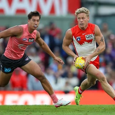 Coach in awe as Heeney steers Swans to win over Suns