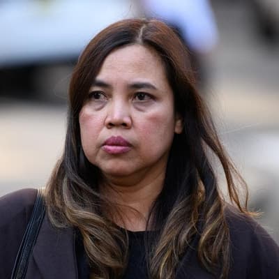 Wife's tearful testimony at love triangle murder trial