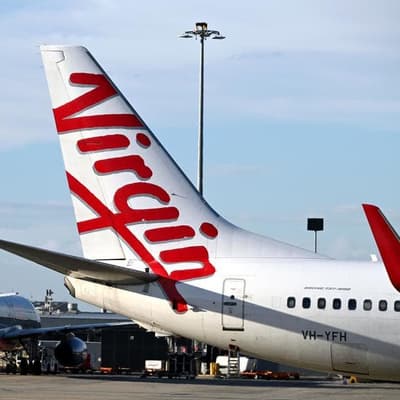 Fewer flights, higher fares take off for airline flyers
