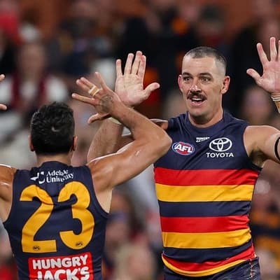 Five-goal Walker leads Crows to tense win over Saints