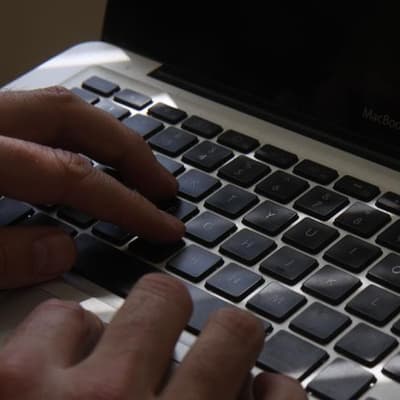 Public servant charged after cyber-theft of 5600 files