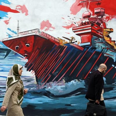 Iran seizes ships in strait after Trump halts attacks