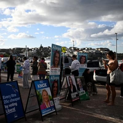 Posters at dawn: election day signage rule to end duels