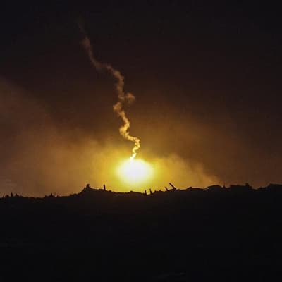 Israeli fire kills 12 across Gaza, medics say