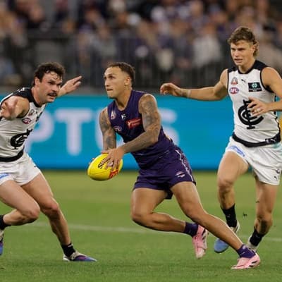 Gritty loss to Dockers caps off horror week for Carlton