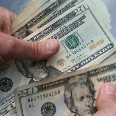 US Fed holds rates, three members dissent on ease bias