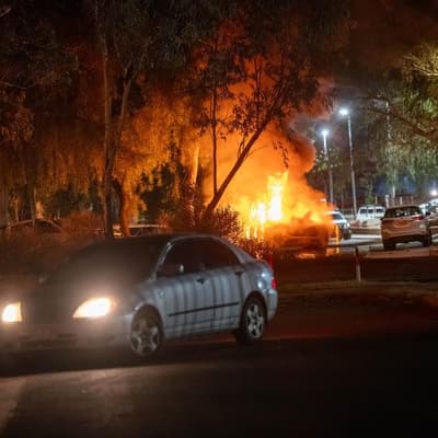 Family calls for calm after riot over accused murderer