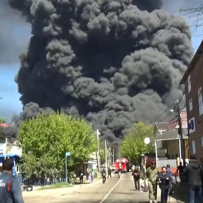 Ukrainian drones strike Russian oil facilities and port