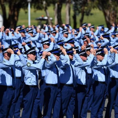 Police force under scrutiny swells ranks with recruits