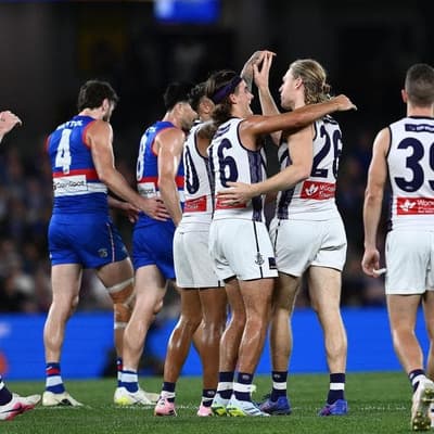 Dockers reach seventh heaven as Dogs fall short