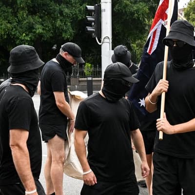 Hate speech charge laid for banner at neo-Nazi rally