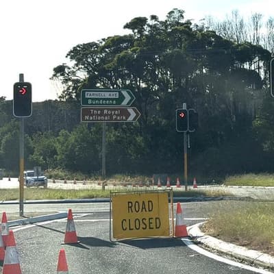 Two charged after car plunges into weir in fatal crash