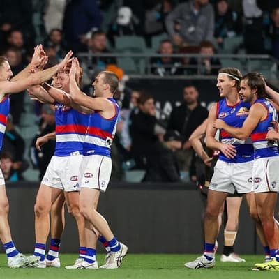 Bulldogs scrap to tense win over Port in AFL thriller