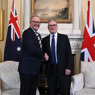 Albanese backs in UK PM amid calls for his resignation