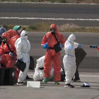 Two more test positive as ship evacuation nears end