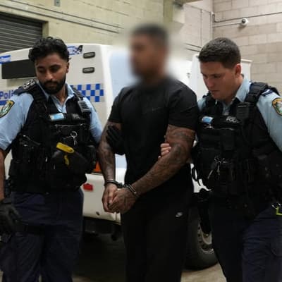 Alleged hit men charged over plot to kill crime boss
