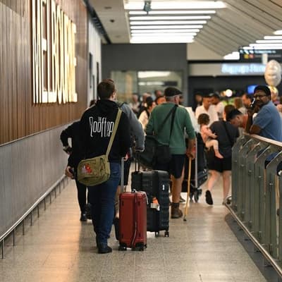 Targets and tests firm up for migrants under budget