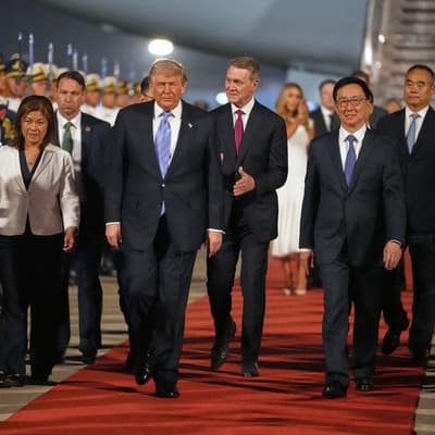 Trump arrives in Beijing for talks with China's Xi
