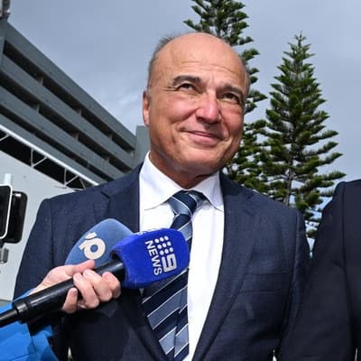 Ex-premier's partner banned from contact in rape case