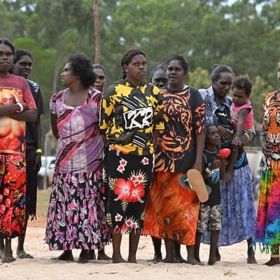 Next-generation Indigenous women flying employment flag